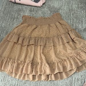 Size small tan with cheetah print